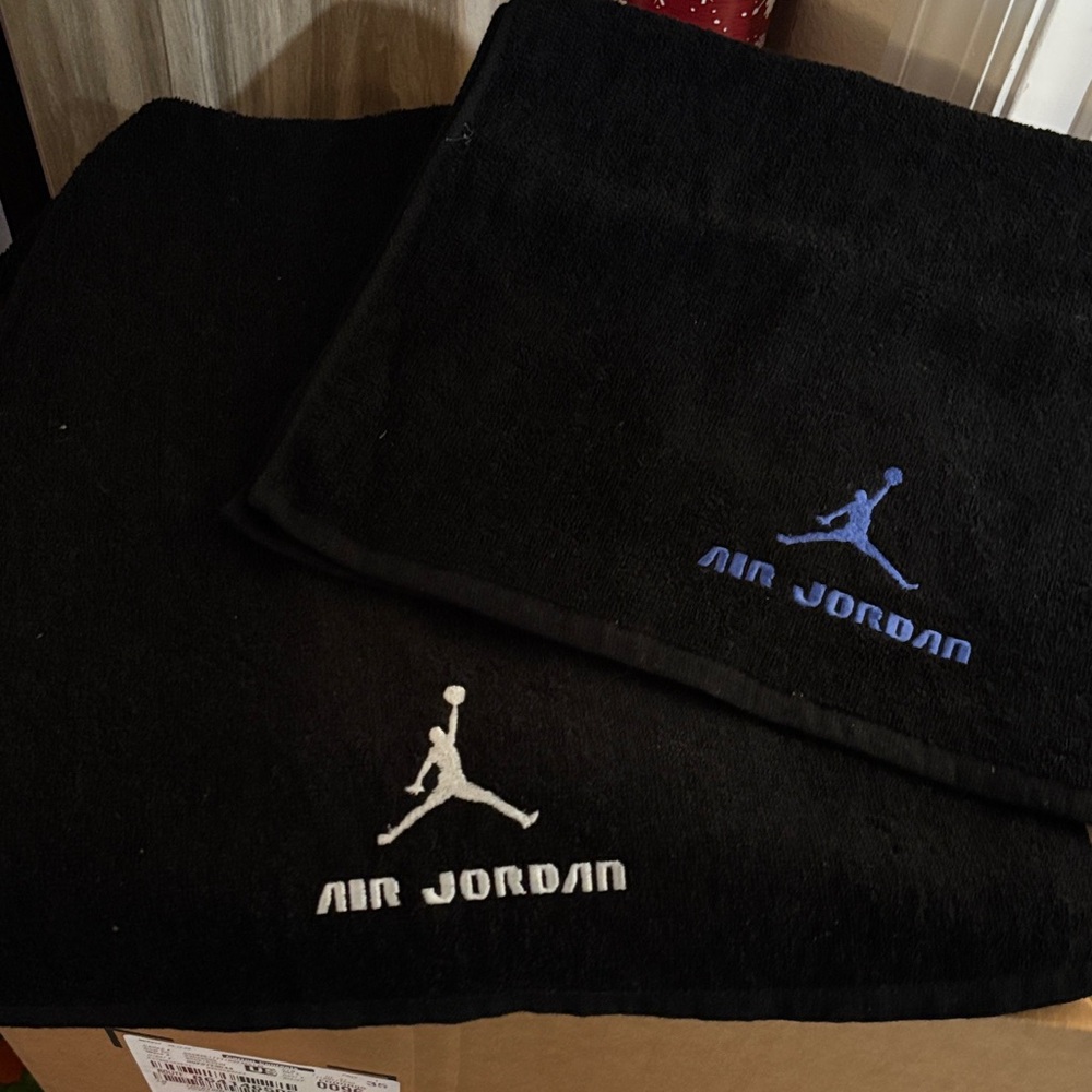 Jordan Black Towels with Blue and White Logo